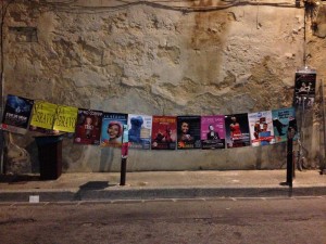 Ligne d'affiches au festival d'Avignon 2015 pour les spectacles Trac!, George Sand, Les Yeux Noirs, Le Cas Martin Piche
